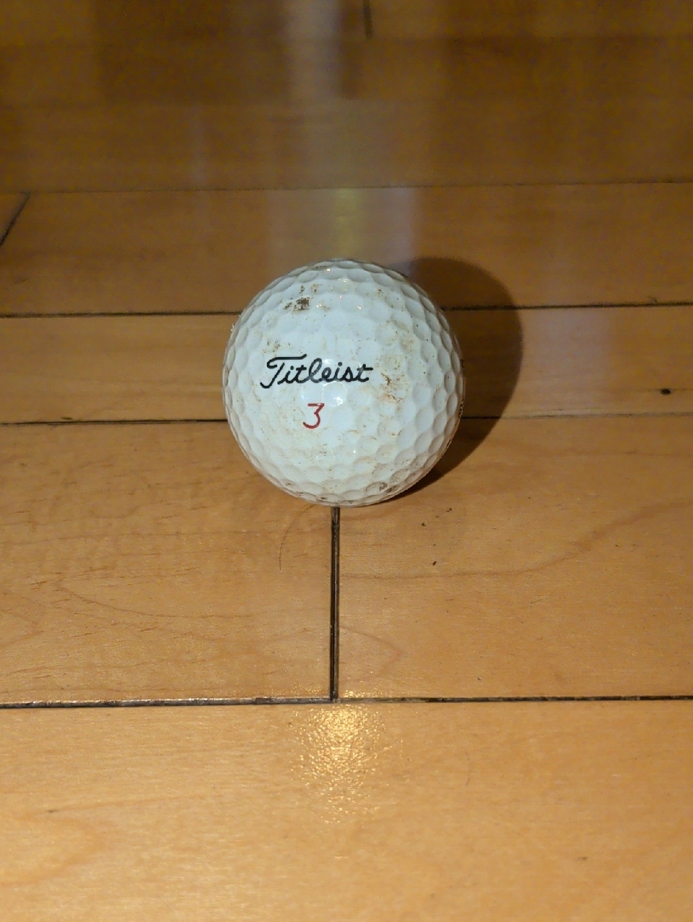 Titleist White Golf Ball with Red Number